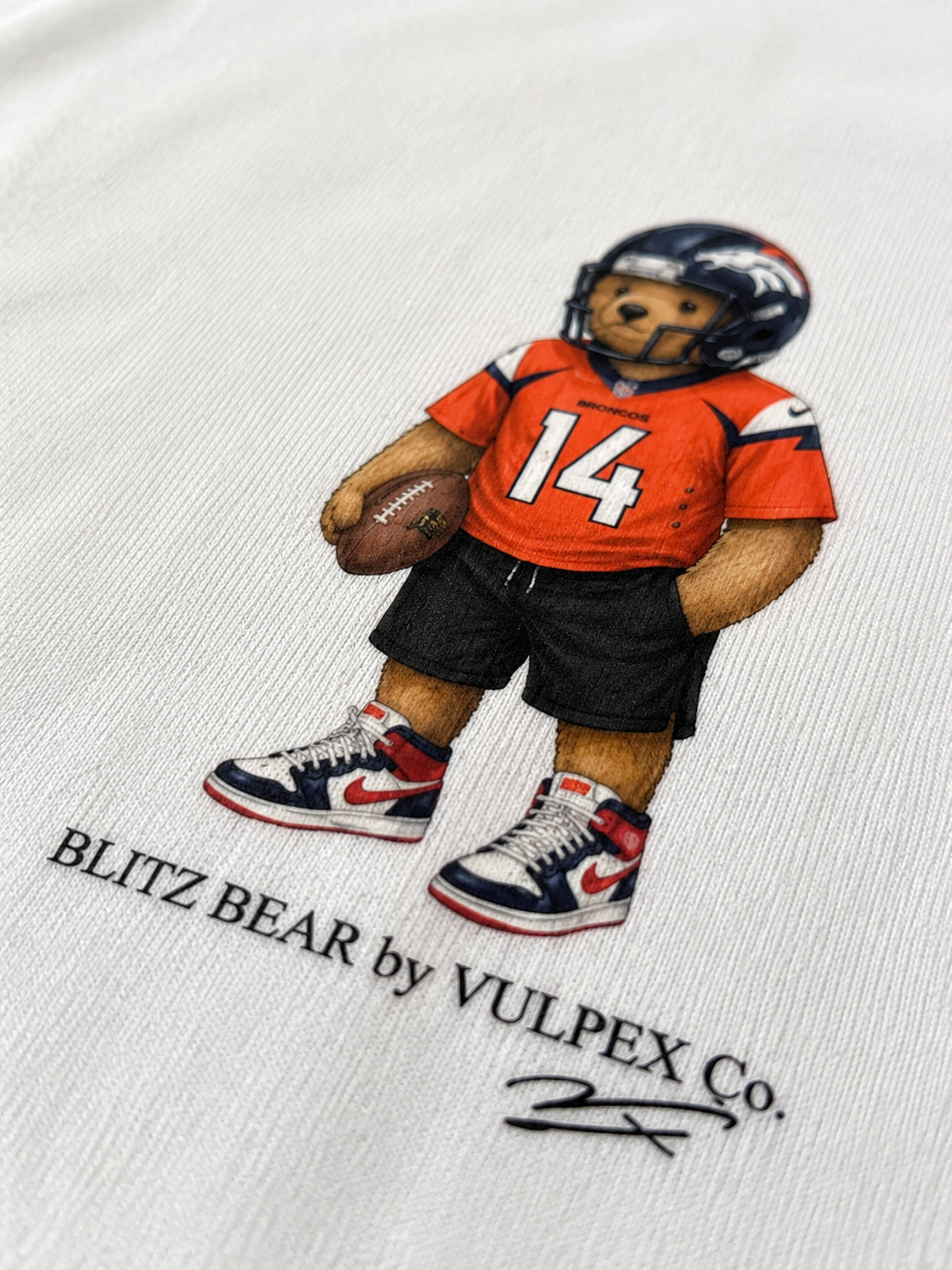 Orange Crush Blitz Bear DTG print macro detail on heavyweight cotton